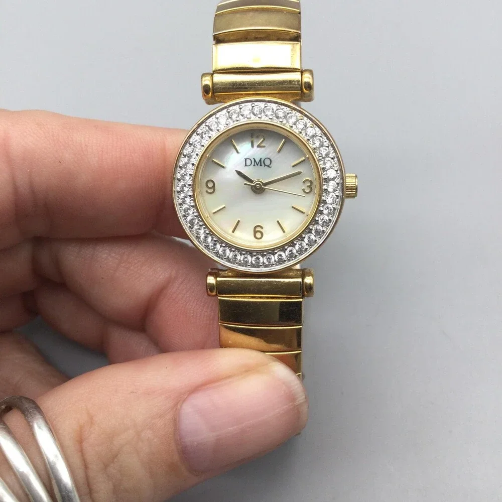 DMQ Womens Watch 24mm MOP Dial Gold Tone Crystals Stretch Band New Battery
